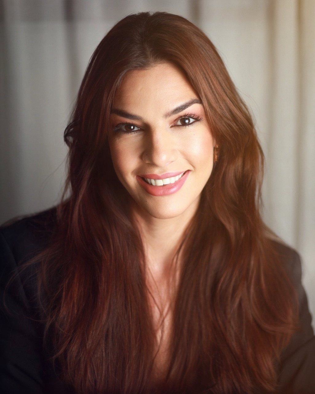 Retrato de Kaytt Simplicio, fotógrafa